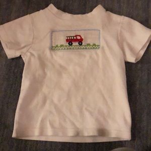 Fire truck smocked toddler top.